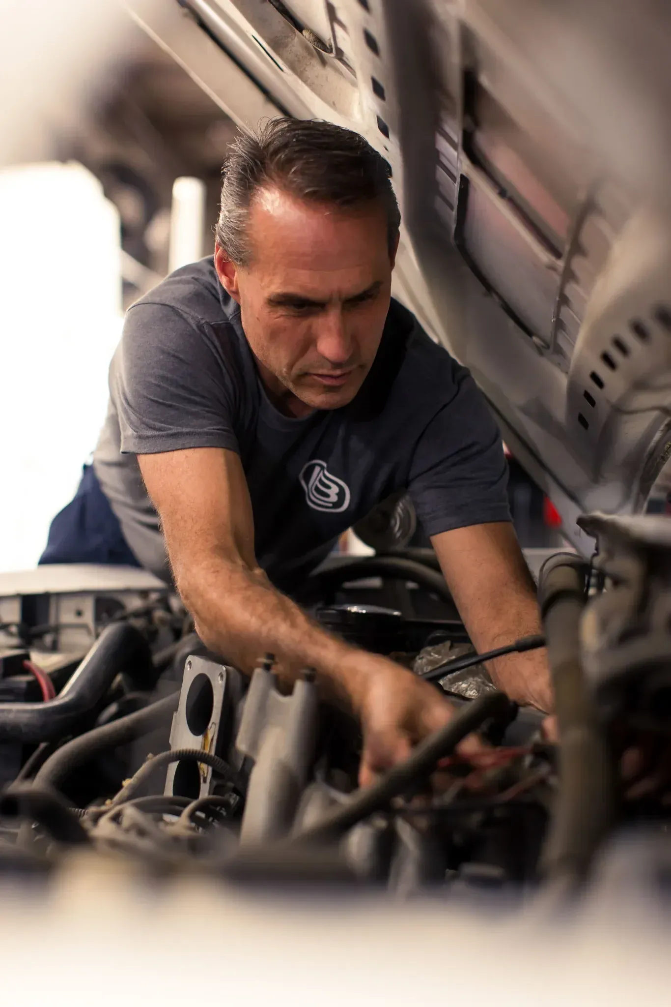 Auto body shop technician at work